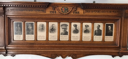 A wooden board with photos of the fallen of the 1914 - 1918 war from the ICR Regular cadre